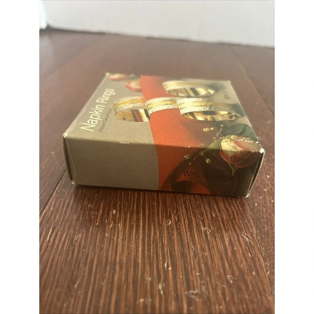Wm. A. Rogers Napkin Rings Set of 4 Silver Plate with Brass New in Box 0117306